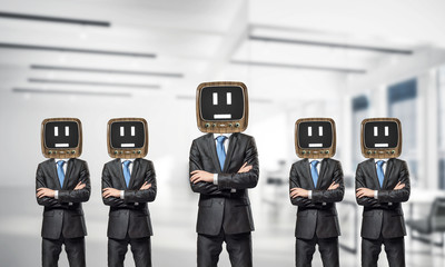Businessmen with old TV instead of head.