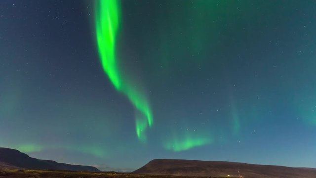 ICELAND –  2016 : Timelapse of amazing Northern Lights at Gódafoss waterfall at night with beautiful landscape in view