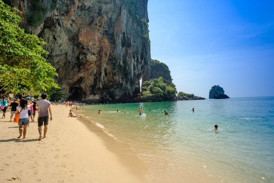 Tropical vacation holiday beach concept. tourist relaxing on Beautiful sea blue Railay beach, Krabi Thailand .