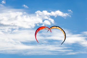 Closeup of heart shape couple of kitesurf