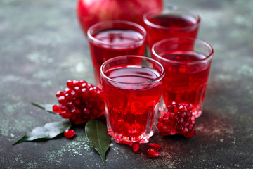 Glasses of fresh pomegranate juice.