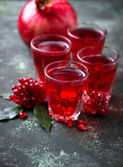 Glasses of fresh pomegranate juice.
