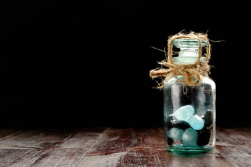 candies closed in jar and tied with rope, diabetes concept, copy space