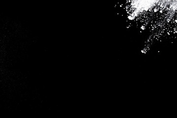 White powder. Grainy abstract texture on black background.