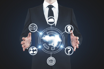 Businessman holding cloud interface
