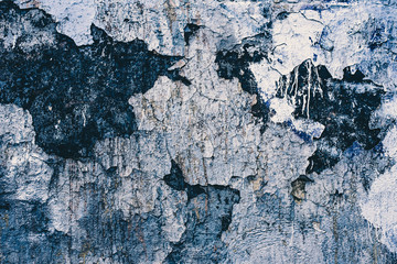 Fototapeta premium Old dark wall with cracked paint - vintage background