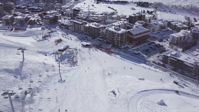 flying over a snow-covered ski slope with a 4k drone. Ski resort in Breuil-Cervinia (italy)