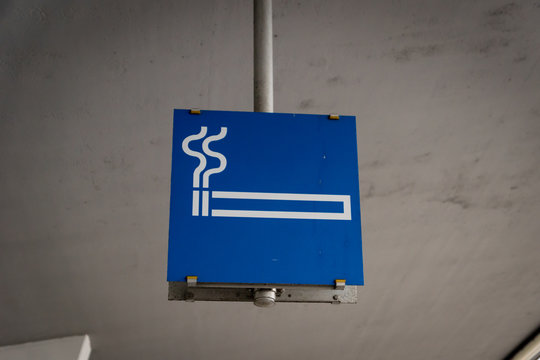 smoking cigarette sign at airport