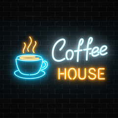 Fototapety  Neonowa kawiarnia szyld na tle ciemnego ceglanego muru. Znak kawiarni gorący napój i jedzenie.