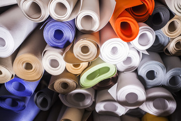 multicolored rolls of fabrics