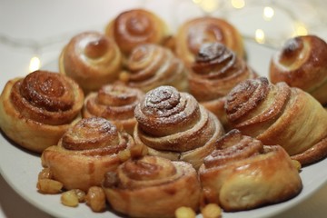 buns with cinnamon in sugar powder with a garland