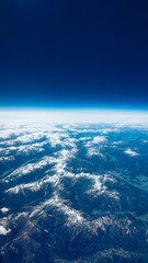 Fototapeta na wymiar Landscape of Mountain. view from the airplane window