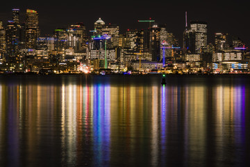 Fototapeta na wymiar Seattle skyline at night reflecting in Lake Washington
