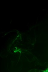 colored smoke on a black background