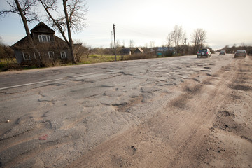 Bad Russian roads / Hole in the asphalt, risk of movement by car, bad asphalt, dangerous road,...