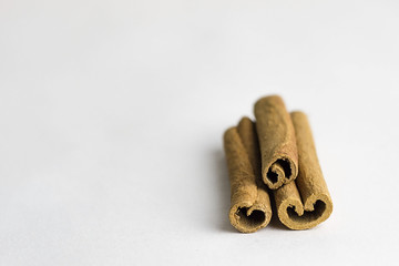 Cinnamon sticks on white background