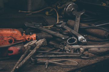 Vintage tools on a worn workbench