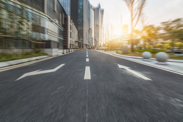 city road through modern buildings in china