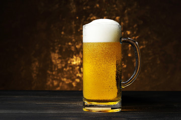 Beer mug on a dark background.