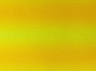 Shiny yellow leaf gold foil texture background.