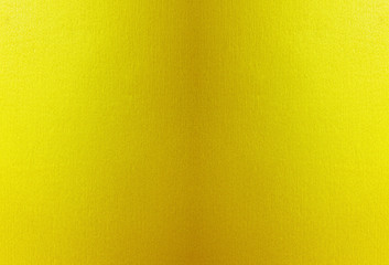 Shiny yellow leaf gold foil texture background.