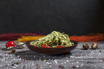 pasta from green spinach with mozzarella, greens and French mustard, quail eggs and cherry tomatoes...