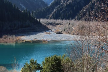 delta of small mountains river and beautiful lake