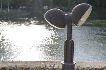 Lamp post over bright lake