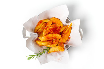 Fried potato sprinkled with paprika powder.