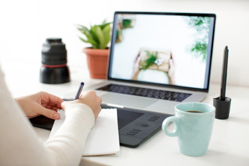 retouching on computer laptop