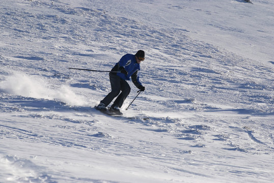 Skier on the mountain slope