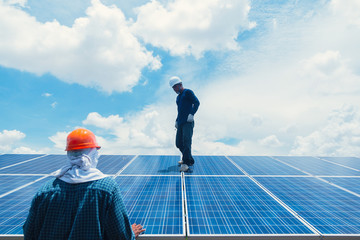engineer team working on replacement solar panel in solar power plant;engineer and electrician team...
