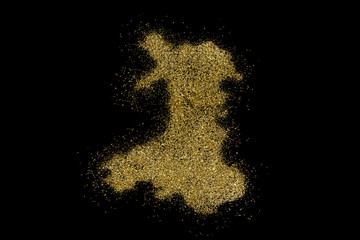 Wales shaped from golden glitter on black (series)