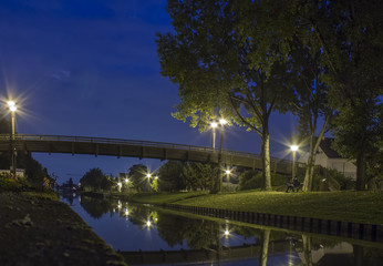bridge over the city river at night