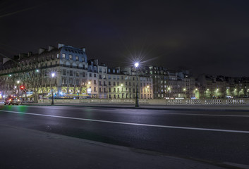 Fototapeta na wymiar empty street at night in Paris