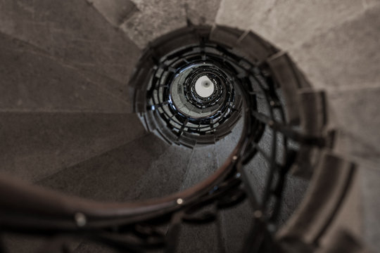 Vintage upward stone spiral stairway - Powered by Adobe