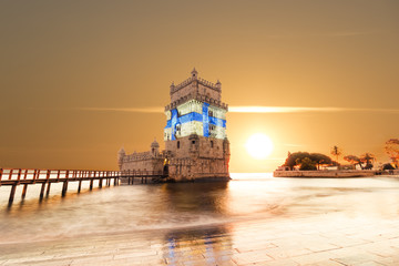 Belem Tower at sunset, sited in St. Vincent in the civil parish of Santa Maria de Belem in the...