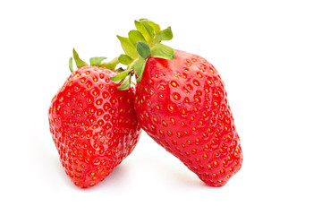 berries of ripe juicy strawberries on white table