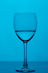 glass of water on a dark blue background