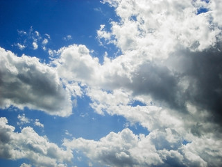 Blue sky with white clouds. Blue sky background