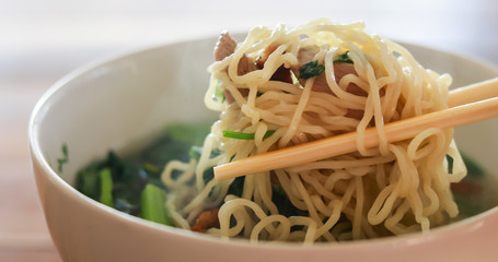 Chinese noodle with chopsticks ready to eat