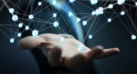 Businesman using flying network balls connection 3D rendering
