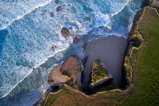 aerial view of famous beach in Northern Spain in the sunset light, Cathedrals beach - Playa de las Catedrales