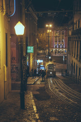 Lisbon at night - Street scene of Lisbon, tram, city life, city lights - Portugal