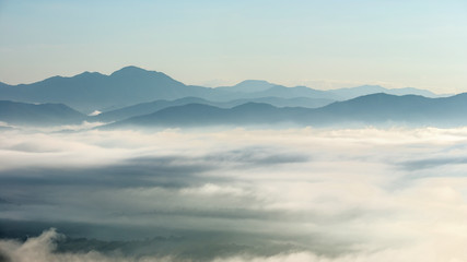 Fototapeta premium Misty landscape with light morning through