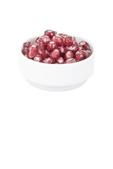 pomegranate seeds on white background