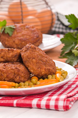 Meatballs on white dish. 