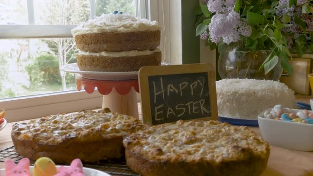 Easter desserts and a sign that says Happy Easter on a chalk board