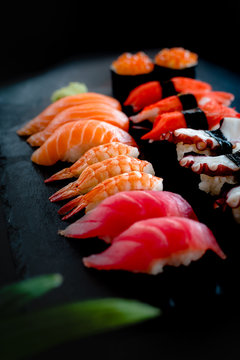 Set of Sushi & Sasimi on black stone plate