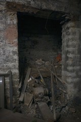 Fototapeta na wymiar Old Boiler room in dirty old basement of warehouse building with rust and trash